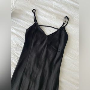 free people black “Simply Biased” midi slip dress